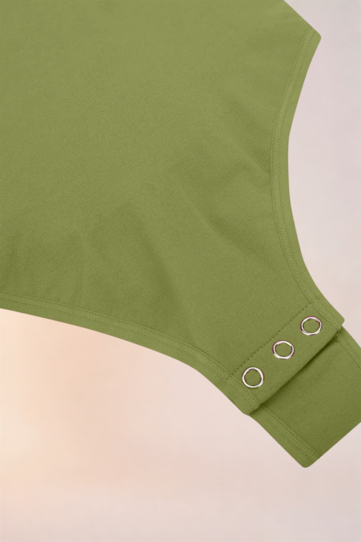 Flat lay of the Skinzform Contour Bodysuit in Olive showing the snap gusset