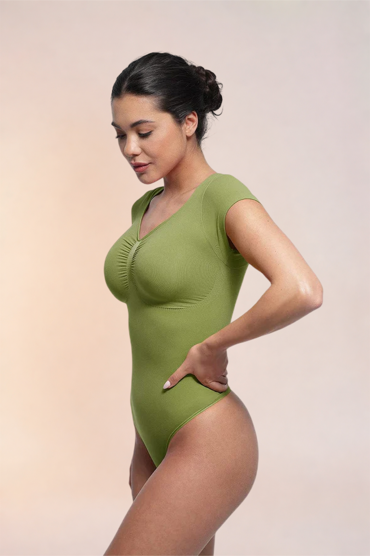 Skinzform Contour Bodysuit in Olive, side view on the model