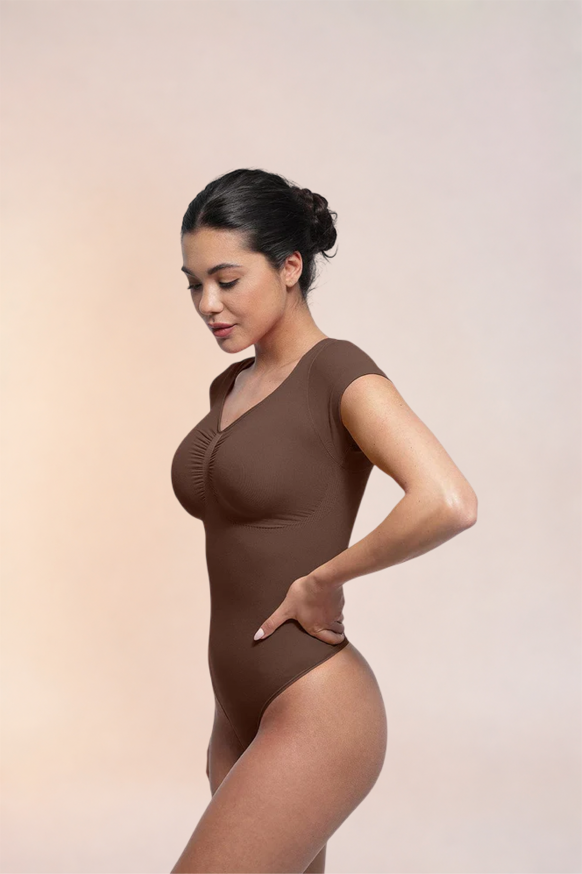 Skinzform Contour Bodysuit in Cacao, side view on the model