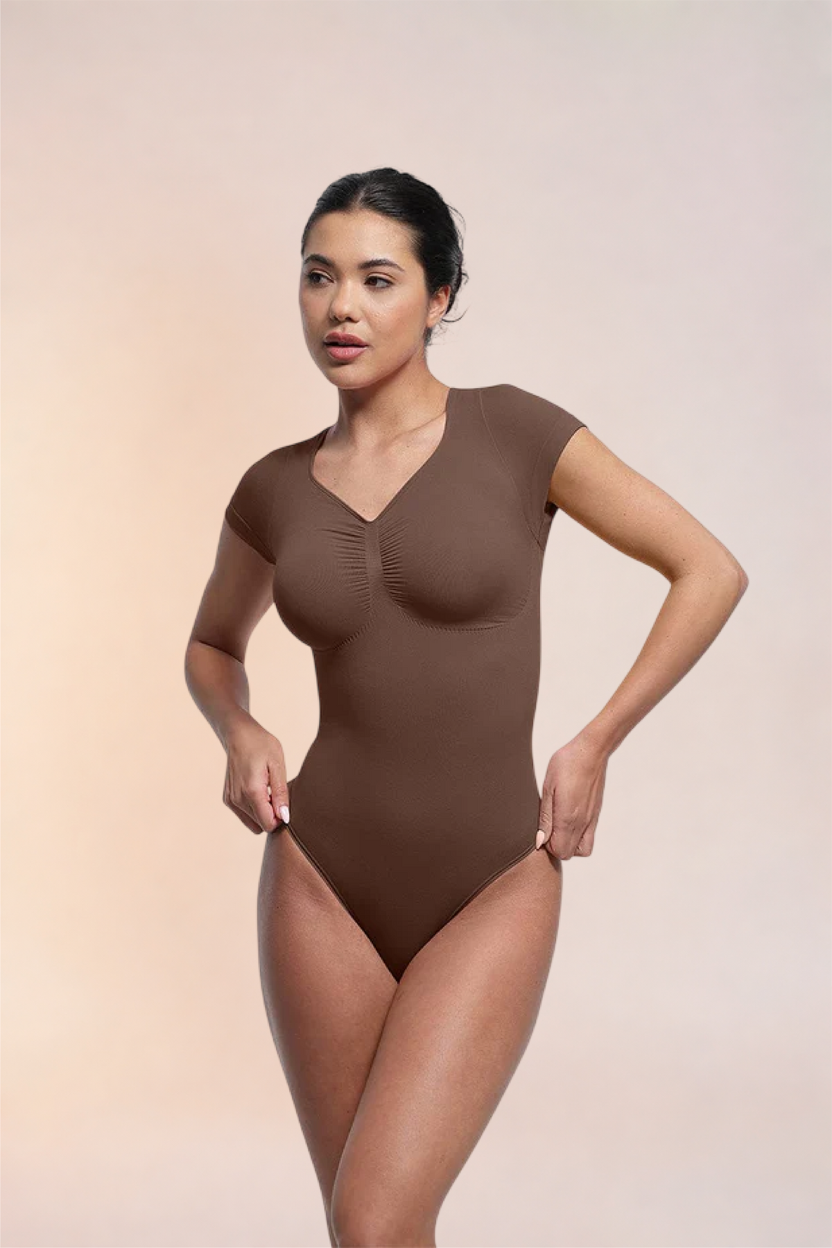 Skinzform Contour Bodysuit in Cacao - angled front view on the model