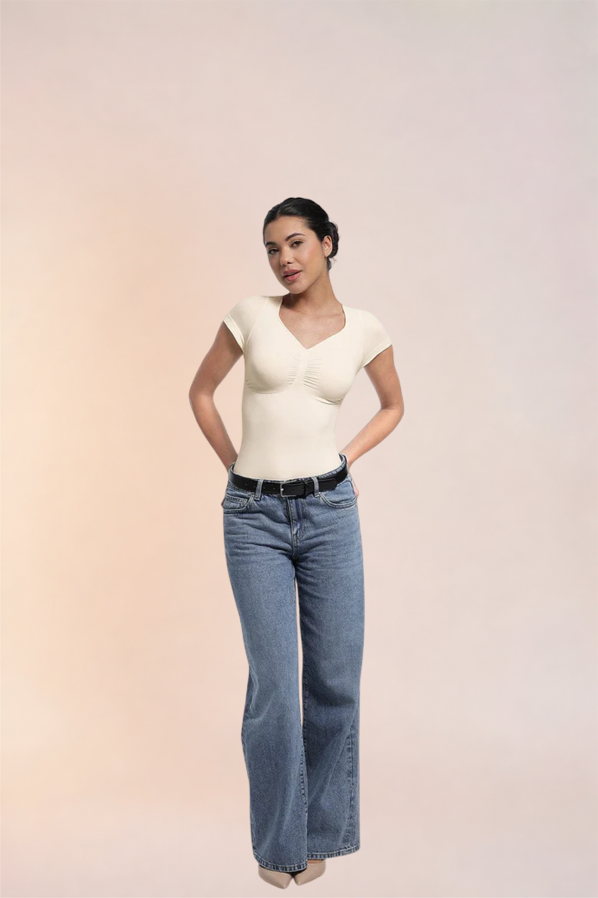 Skinzform Contour Bodysuit in Blanc styled with jeans, full-length front view