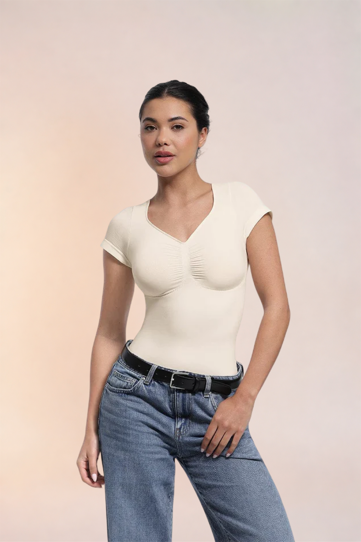 Skinzform Contour Bodysuit in Blanc styled with jeans, half-length front view