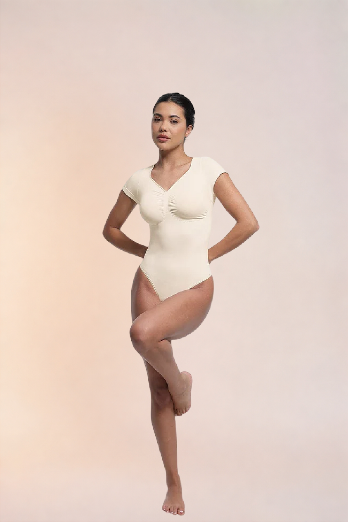 Skinzform Contour Bodysuit in Blanc, front view on the model