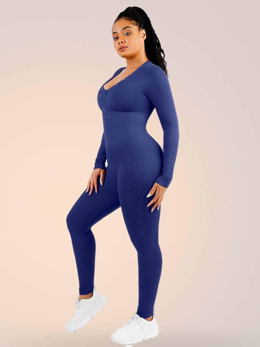Skinzform Deep V Jumpsuit in Royal Blue, side view - full-length fit worn with trainers