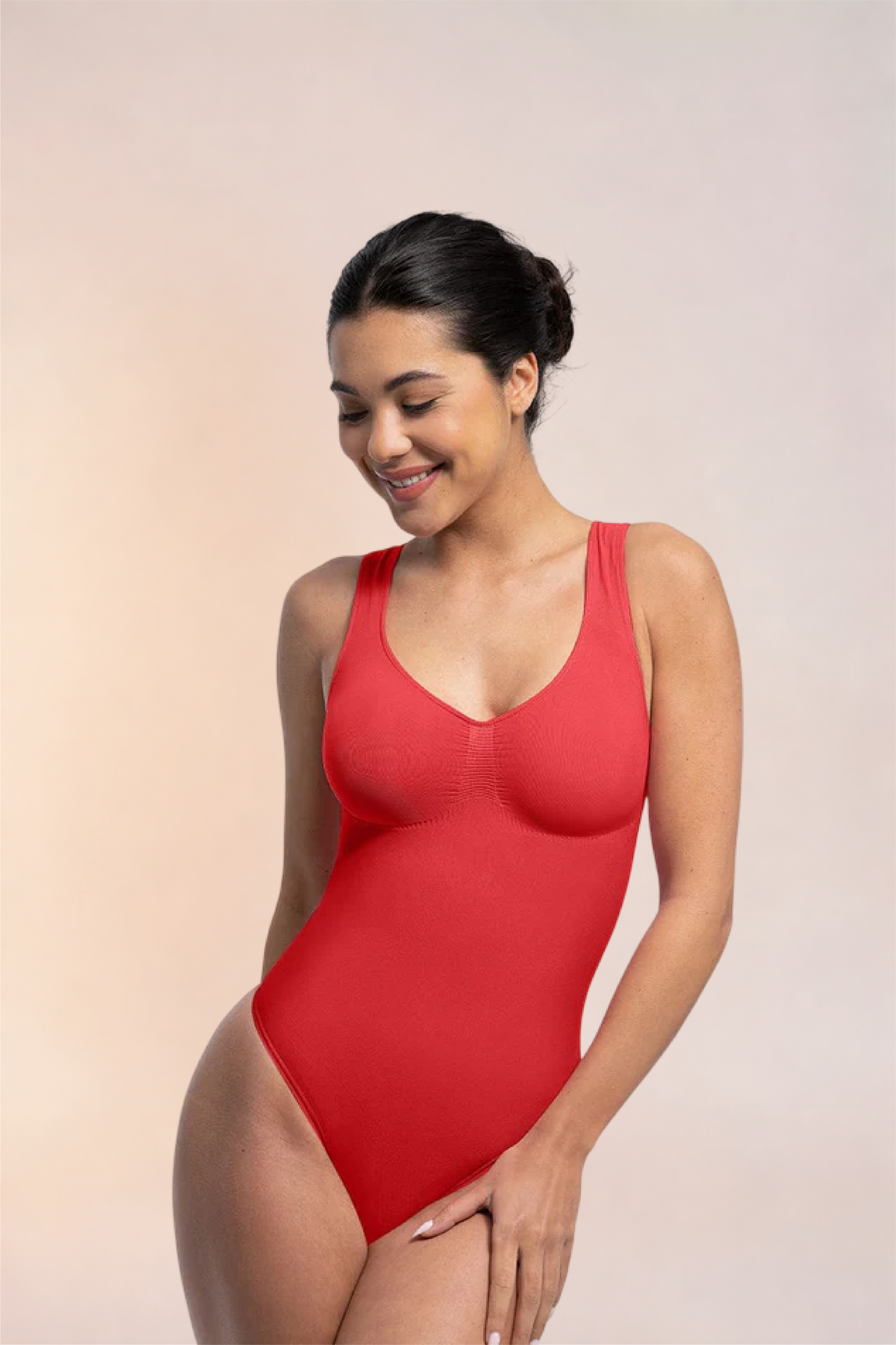 Skinzform Diamant Bodysuit in Rouge - angled front view on the model