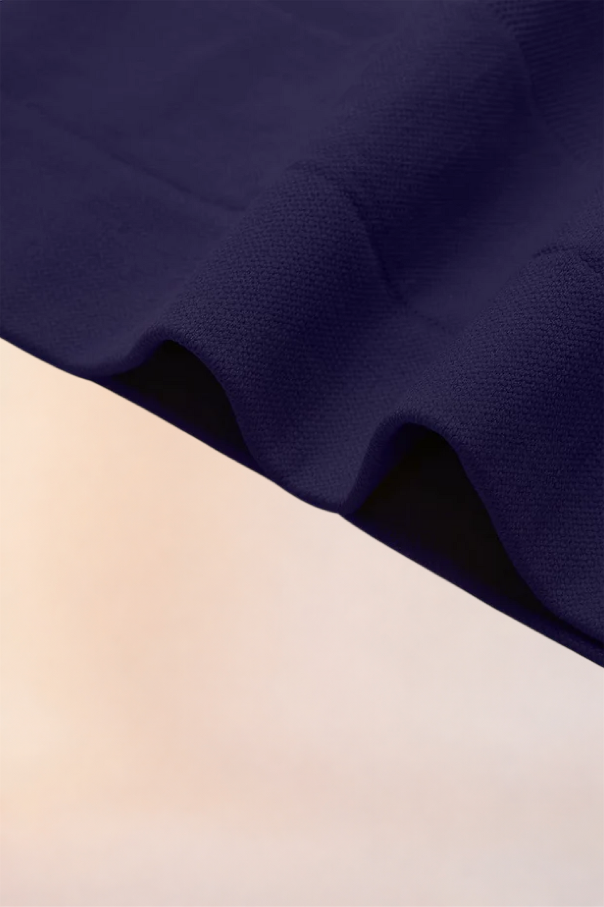 Close-up of the fabric used in the Skinzform Diamant Top in Navy
