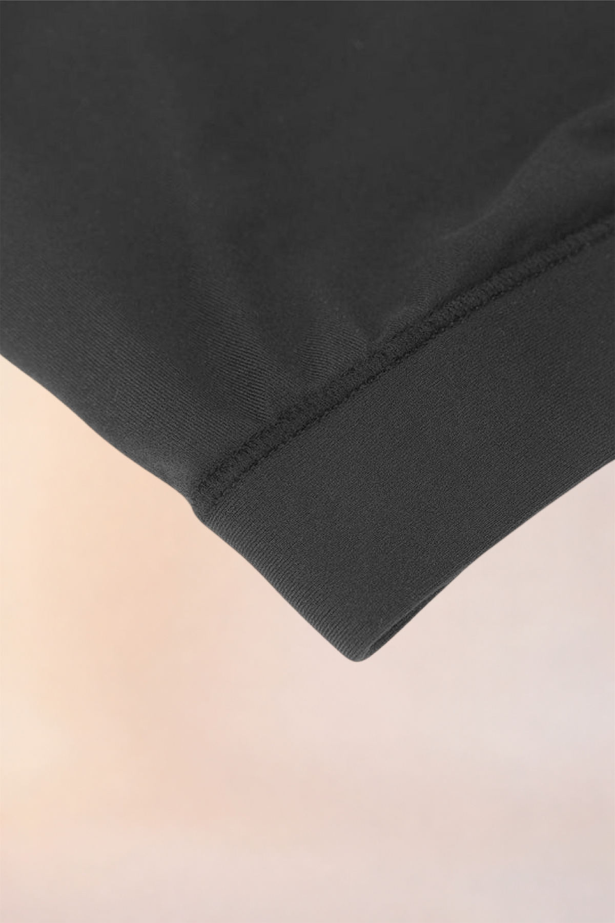 Close-up of the ribbed underband on the Skinzform Doux Bralette in Noir