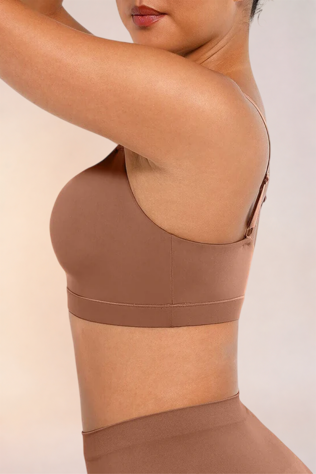 Close-up of the side seam and underarm on the Skinzform Doux Bralette in Latte