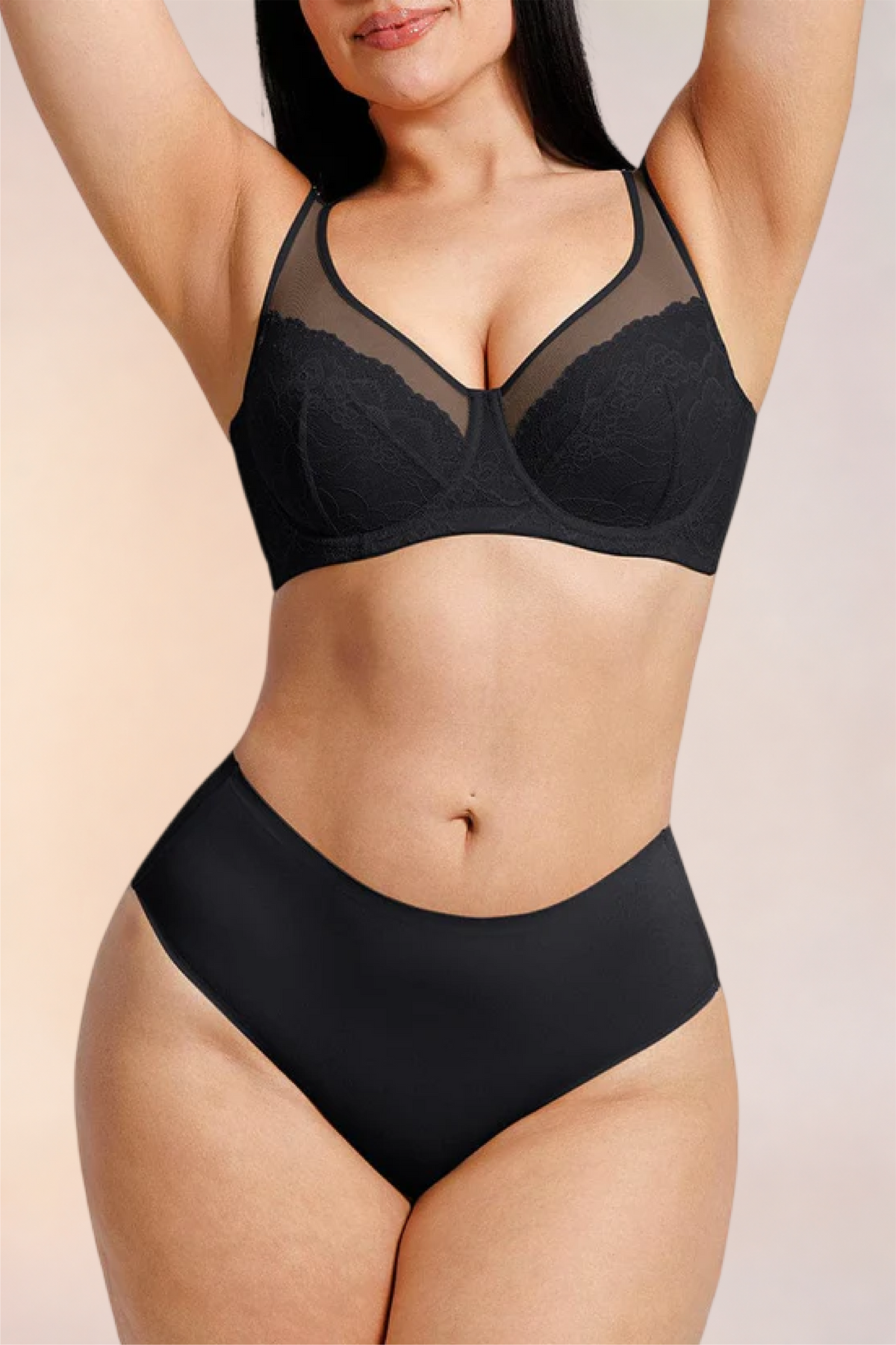 Close-up of the lace cups and neckline on the Skinzform Élégance Bra in Noir