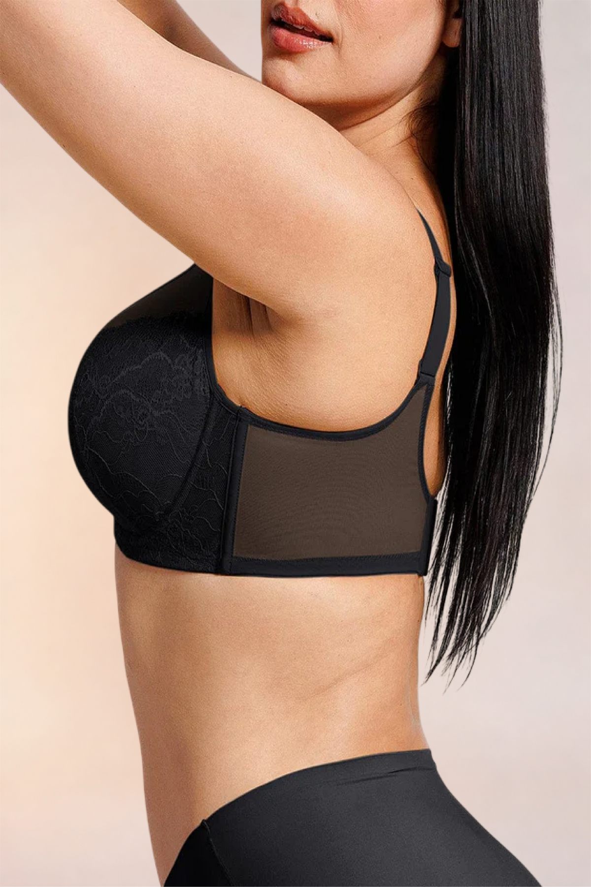 Close-up of the lace cup in profile on the Skinzform Élégance Bra in Noir