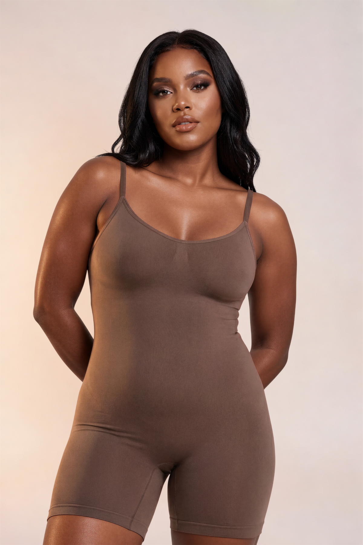 Skinzform Plus Size Full Body Shaper in Cacao, half-length front view on the model