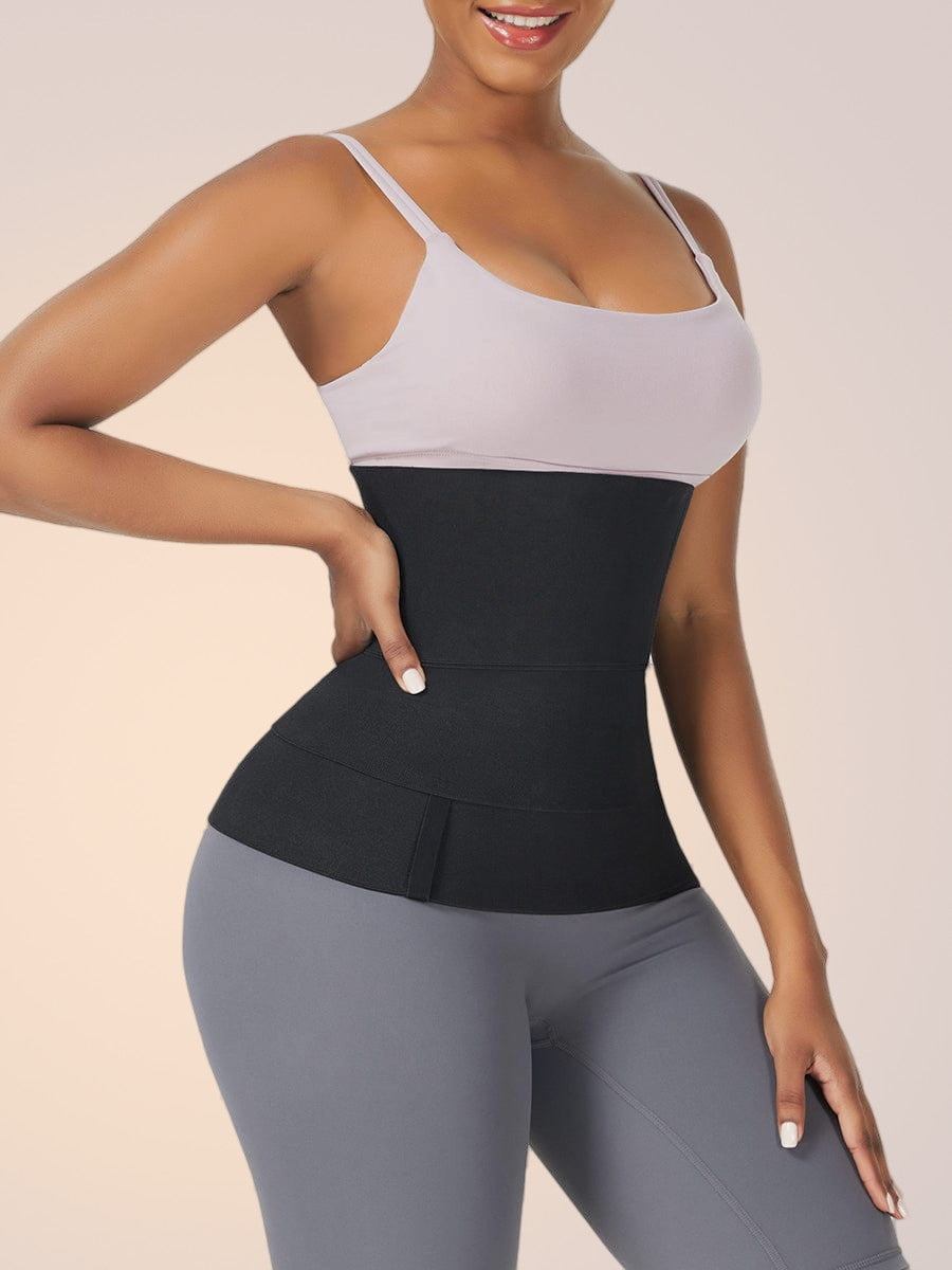 Skinzform Latex Wrap in Noir, angled view - smooth compression band across the waist