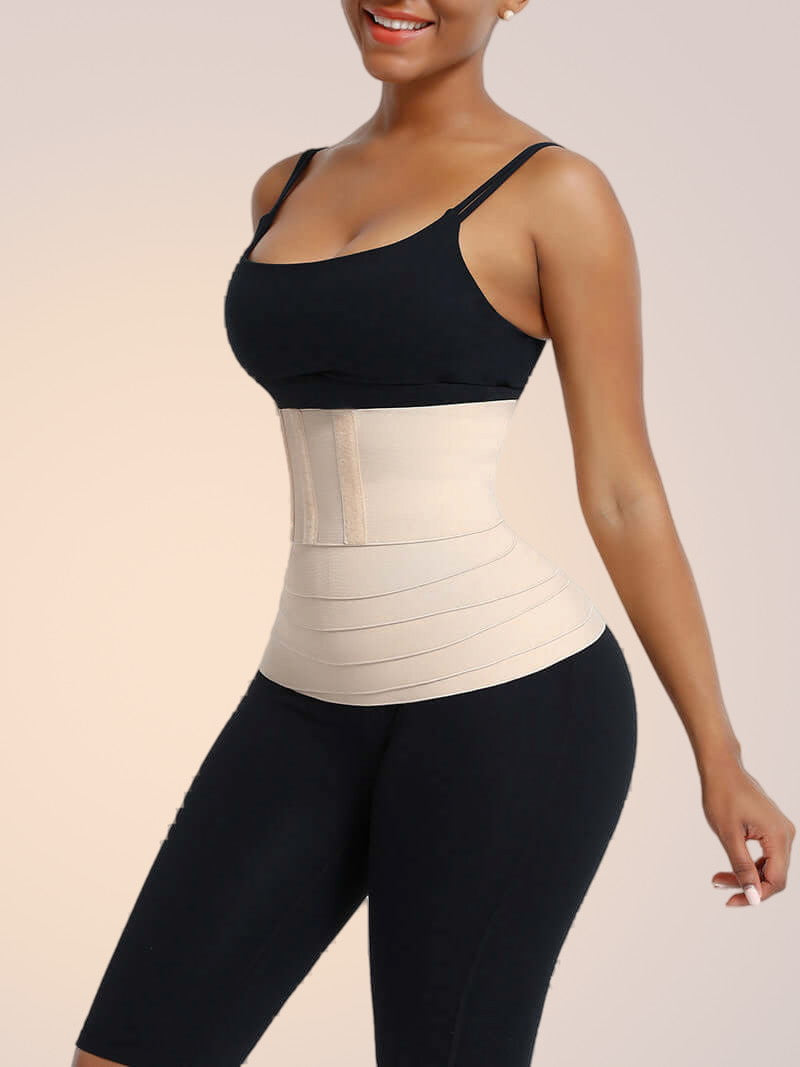 Skinzform Latex Wrap in Nude - model wrapping the band around the waist