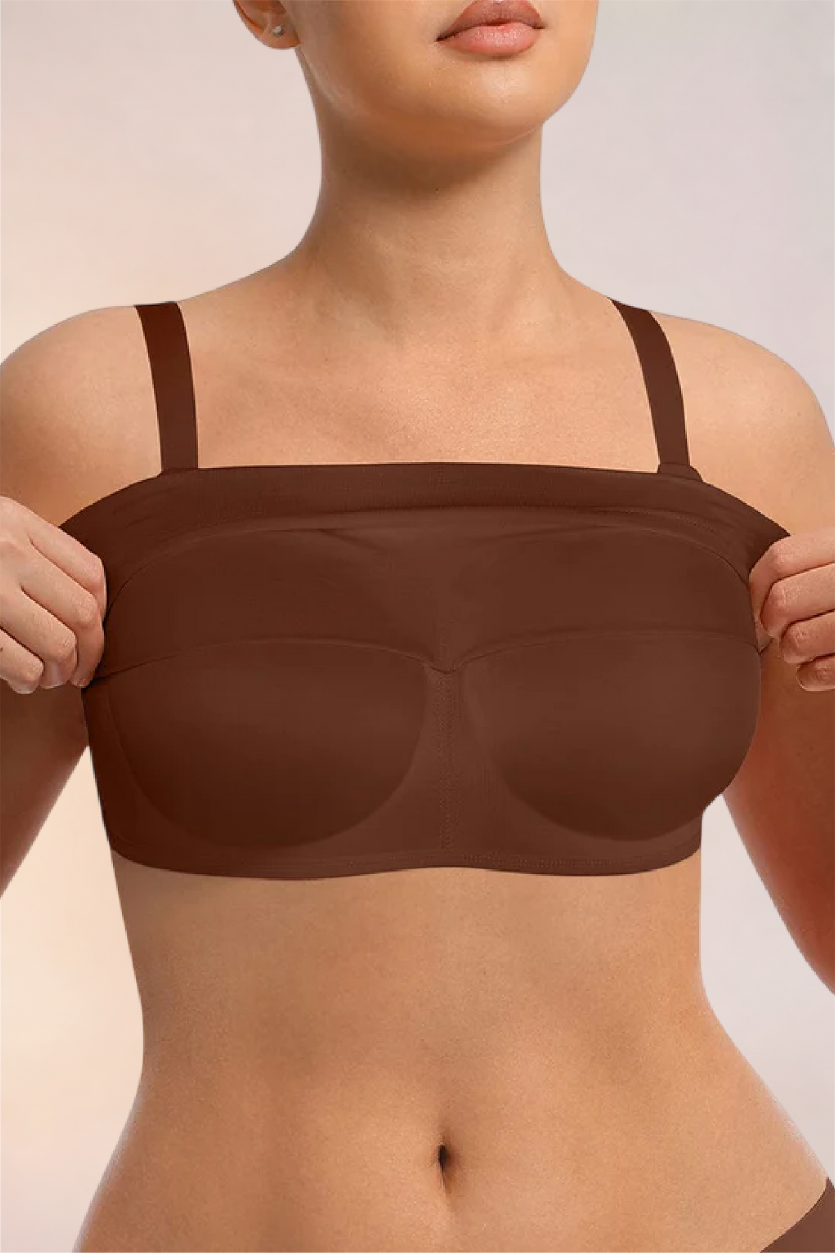 Skinzform Nuage Bra in Cacao - model easing the underband down
