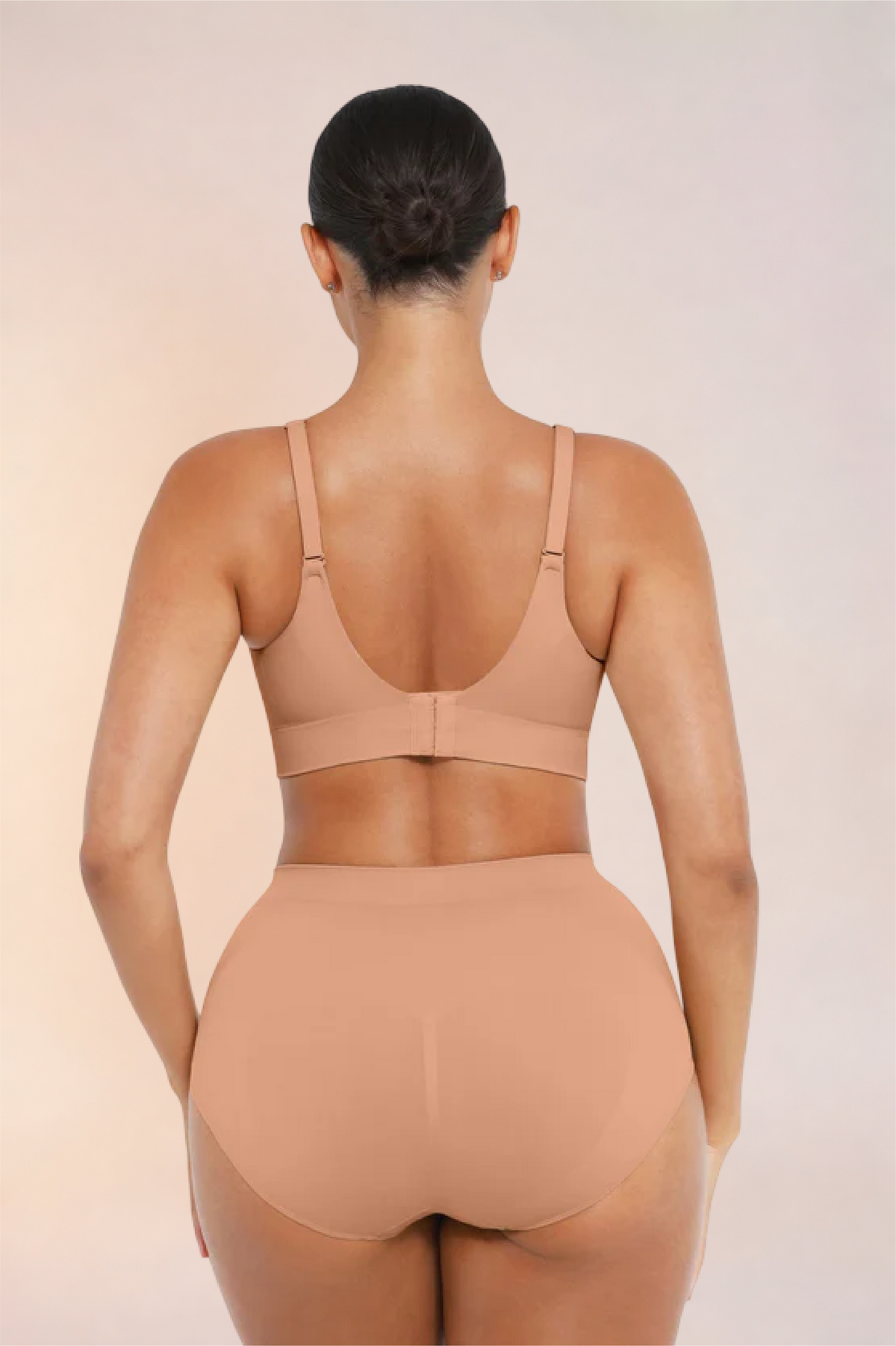 Skinzform Nuage Bra in Dark Skin worn with matching briefs, back view
