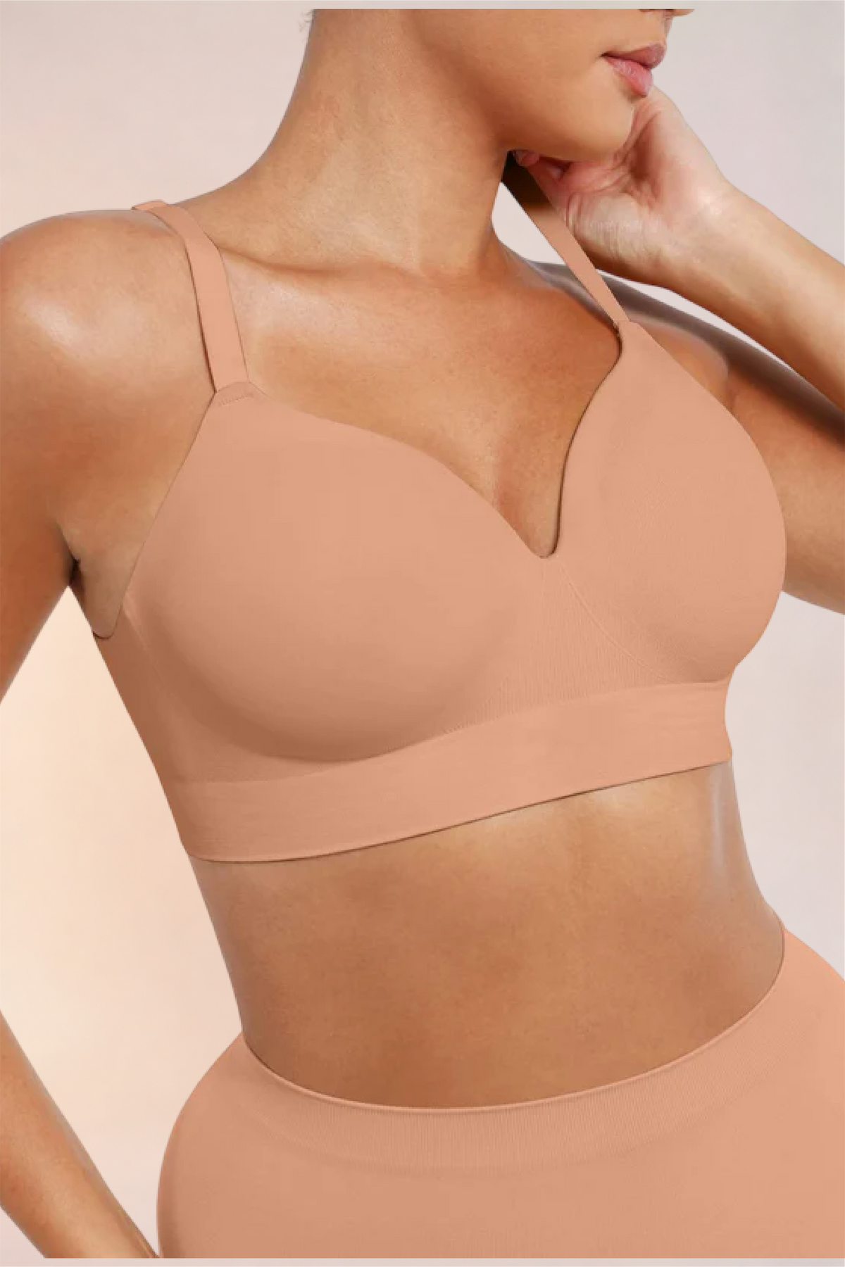 Close-up of the neckline and straps on the Skinzform Nuage Bra in Dark Skin
