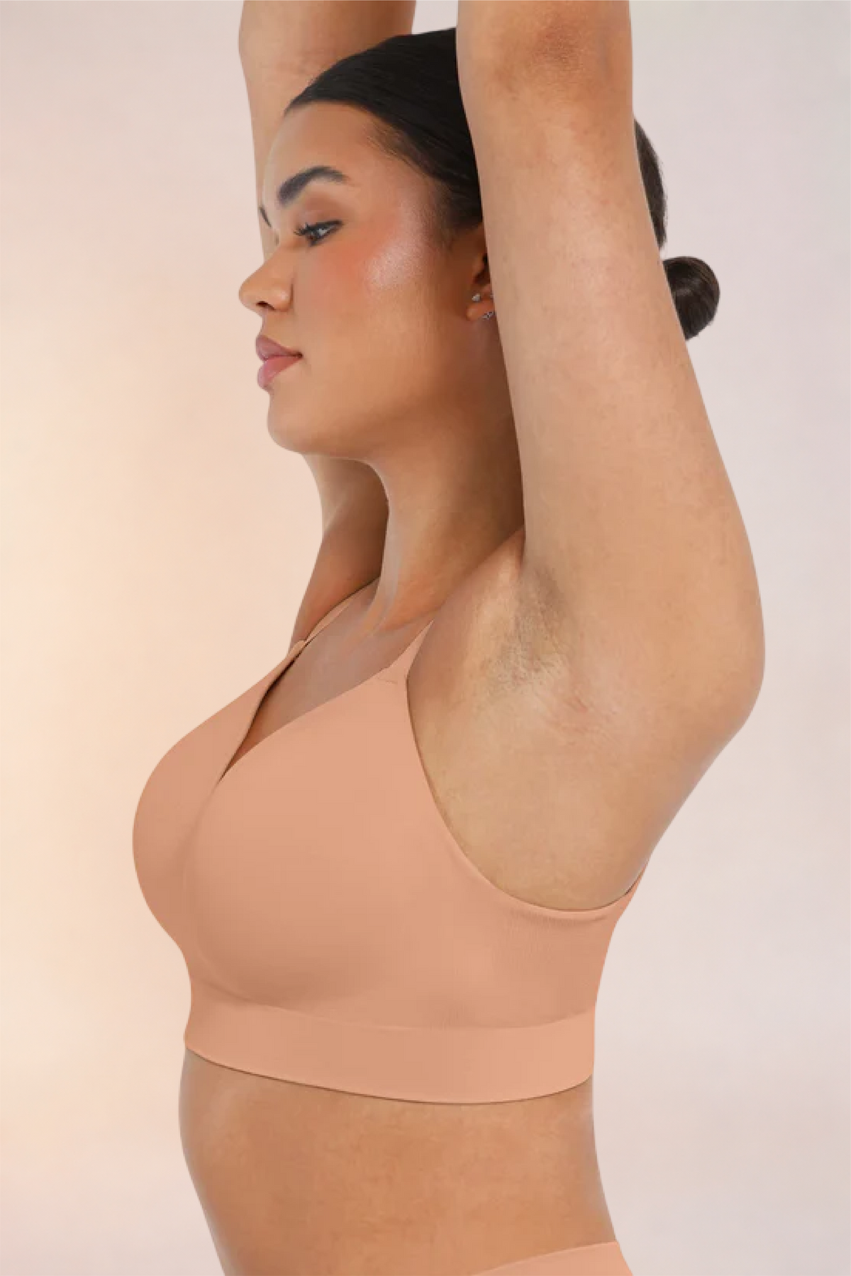 Skinzform Nuage Bra in Dark Skin - side view with one arm raised