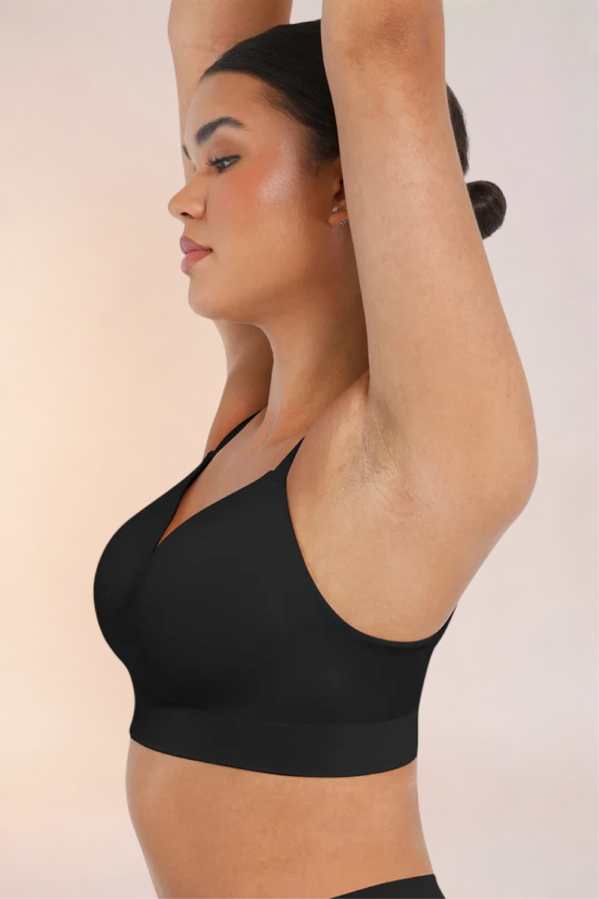 Skinzform Nuage Bra in Noir - side view with one arm raised