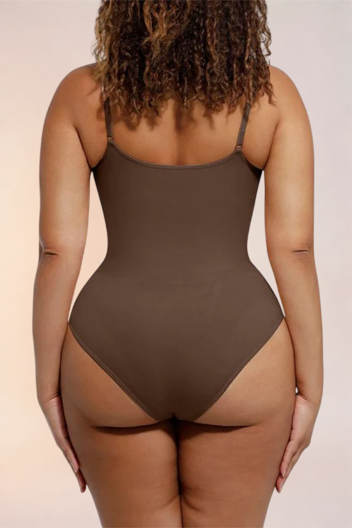 Close-up of the thong-cut back on the Skinzform Core Brief in Cacao