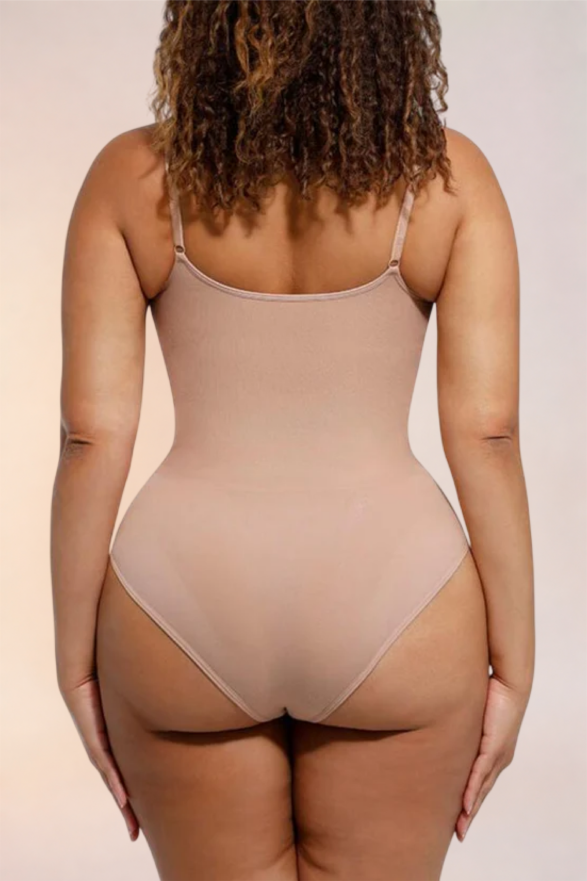 Close-up of the thong-cut back on the Skinzform Core Brief in Nude
