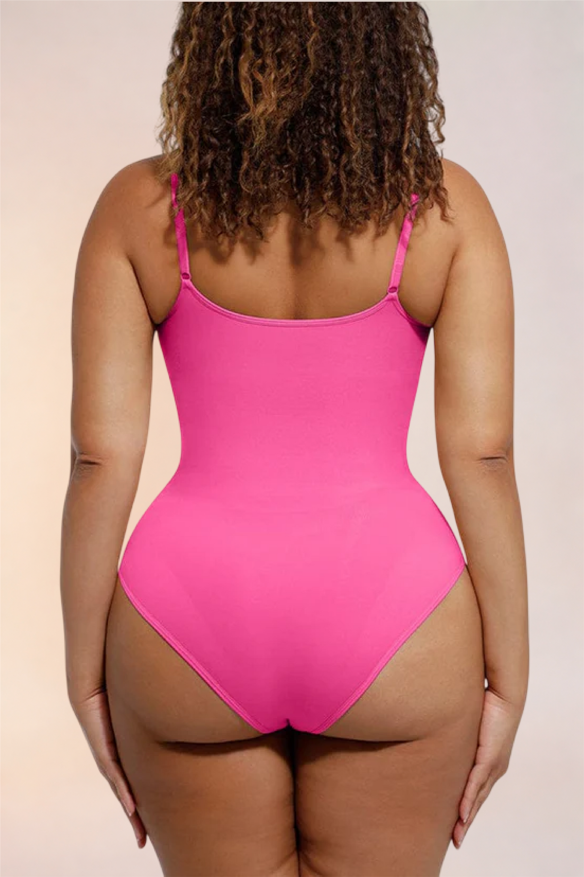 Close-up of the thong-cut back on the Skinzform Core Brief in Rose