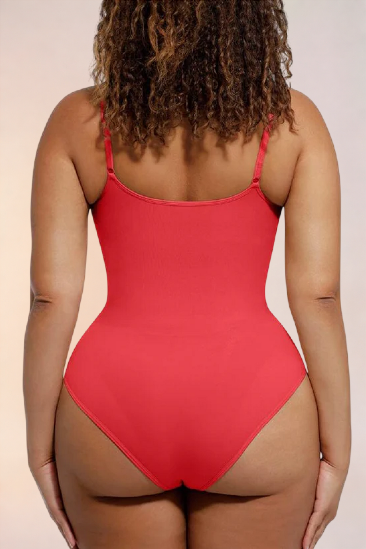Close-up of the thong-cut back on the Skinzform Core Brief in Rouge