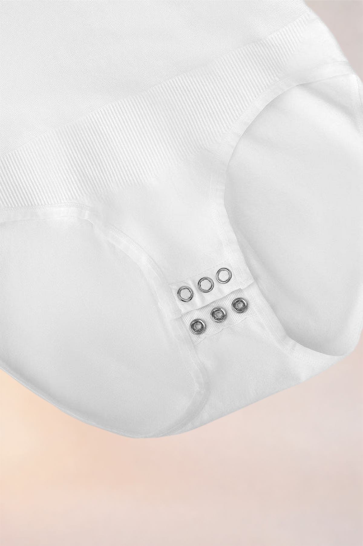 Flat lay of the Skinzform Peach Round-Neck Brief in Blanc showing the snap gusset