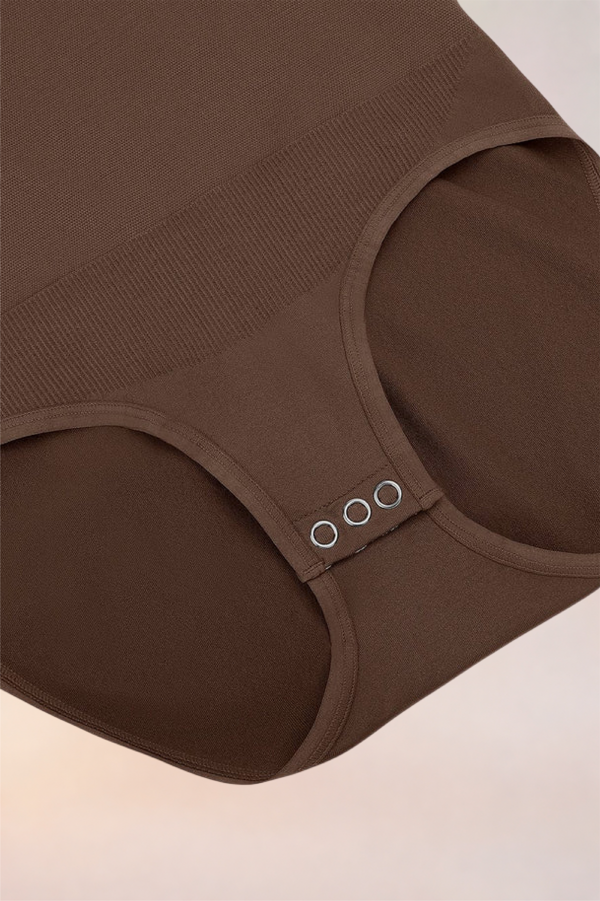Flat lay of the Skinzform Peach Round-Neck Brief in Cacao showing the snap gusset