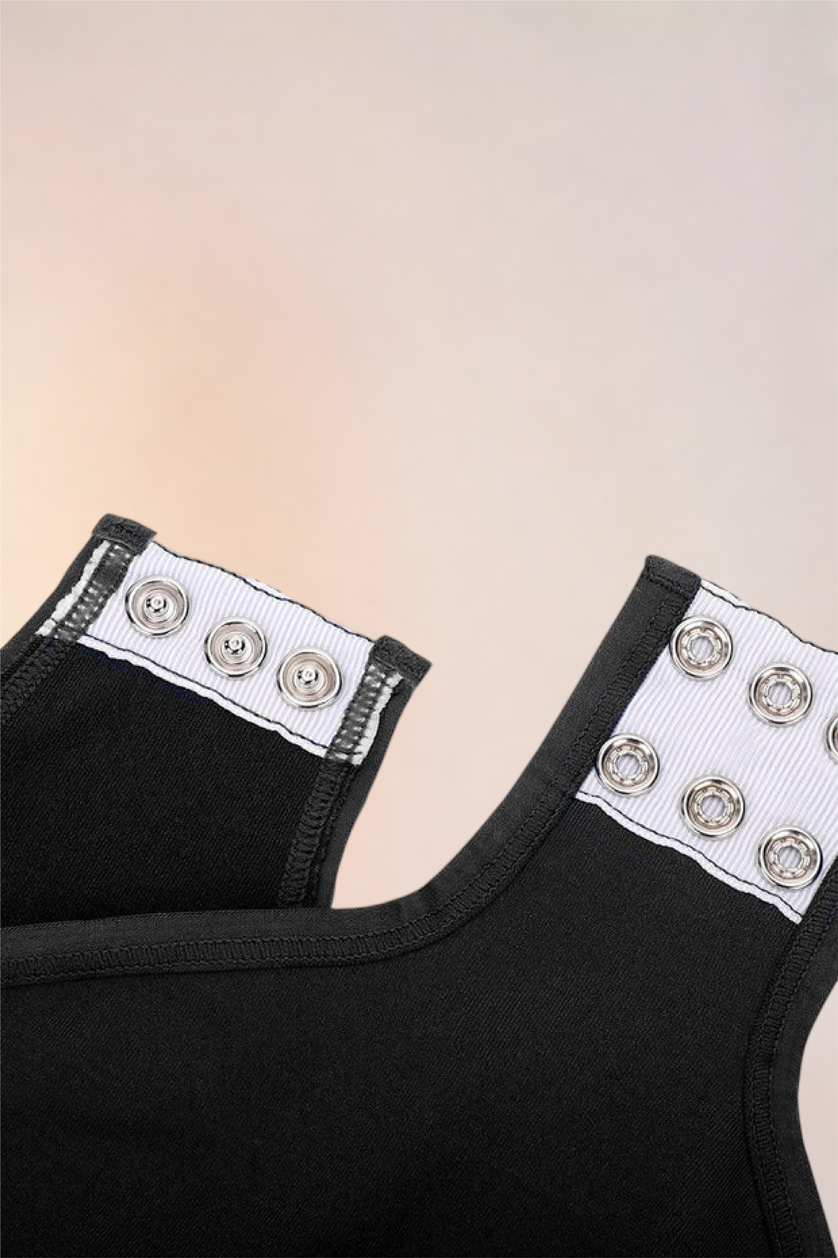 Close-up of the gusset snap tape on the Skinzform Peach Round-Neck Brief in Noir