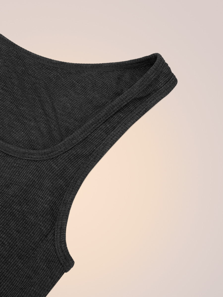 Flat lay of the Skinzform Ribbed Tank in Noir showing the shoulder strap and neckline