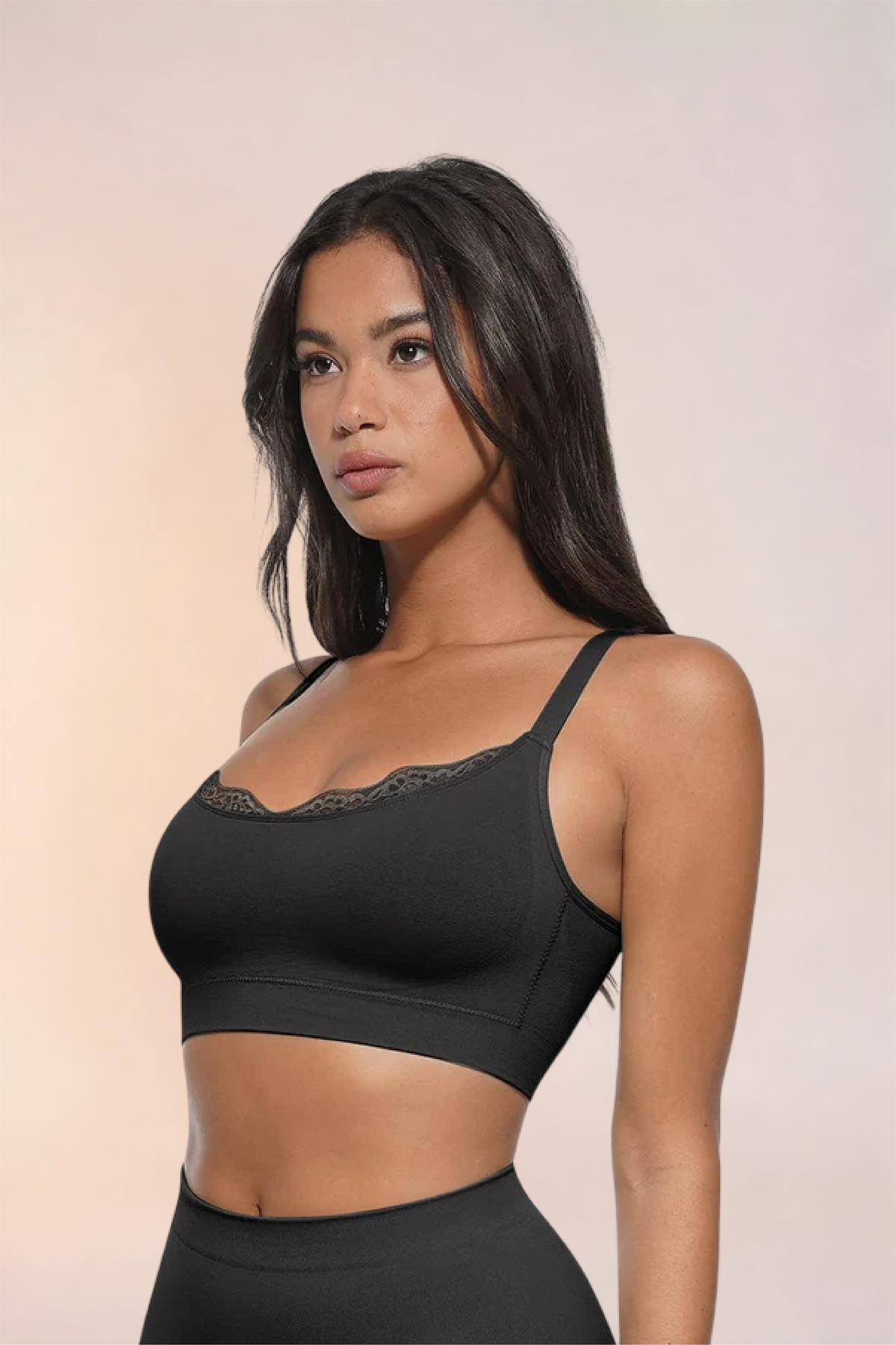 Skinzform Scoop Bralette in Noir - lace-trimmed bralette worn with matching bottoms, half-length front view