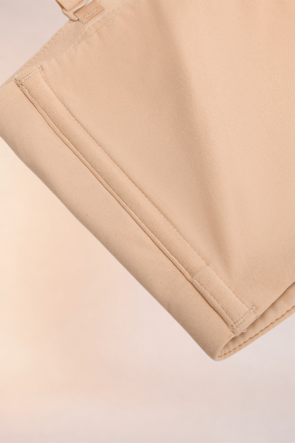 Close-up of the ribbed underband on the Skinzform Scoop Bralette in Nude