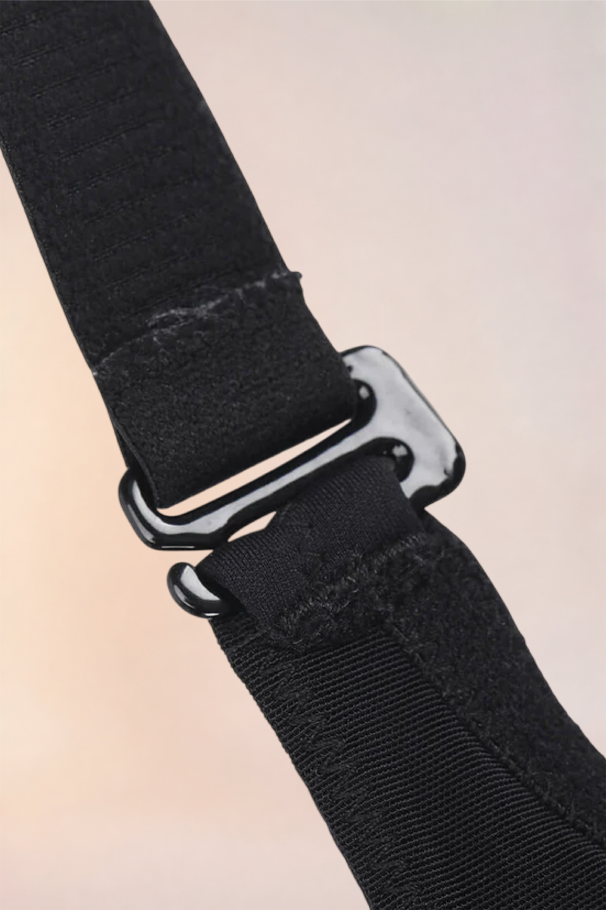 Close-up of the strap slider on the Skinzform Sculpt Bra in Noir