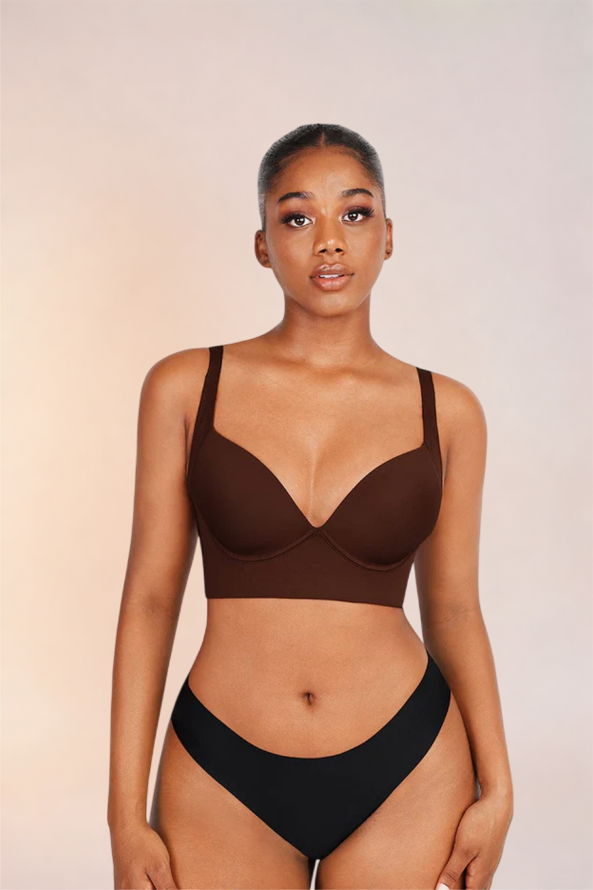 Skinzform Sculpt Bra – Cacao worn with black briefs, front view with both hands at the hips