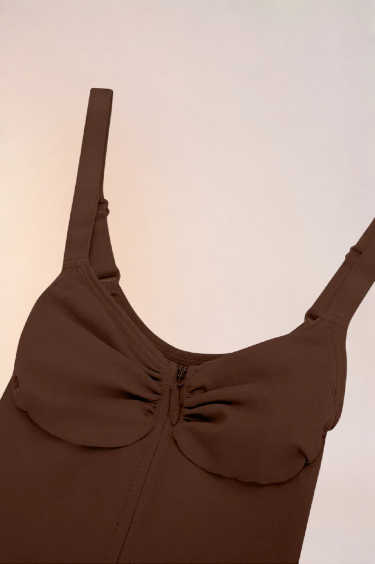 Close-up of the moulded cups and ruched centre on the Skinzform Séjour Bodysuit in Cacao