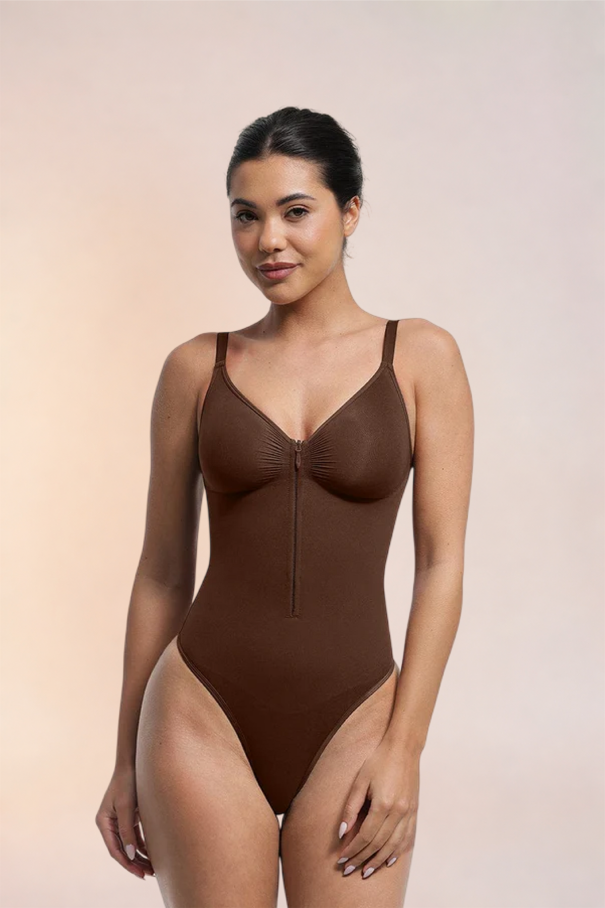 Skinzform Séjour Bodysuit in Cacao - zip-front bodysuit with thong cut, front view on the model