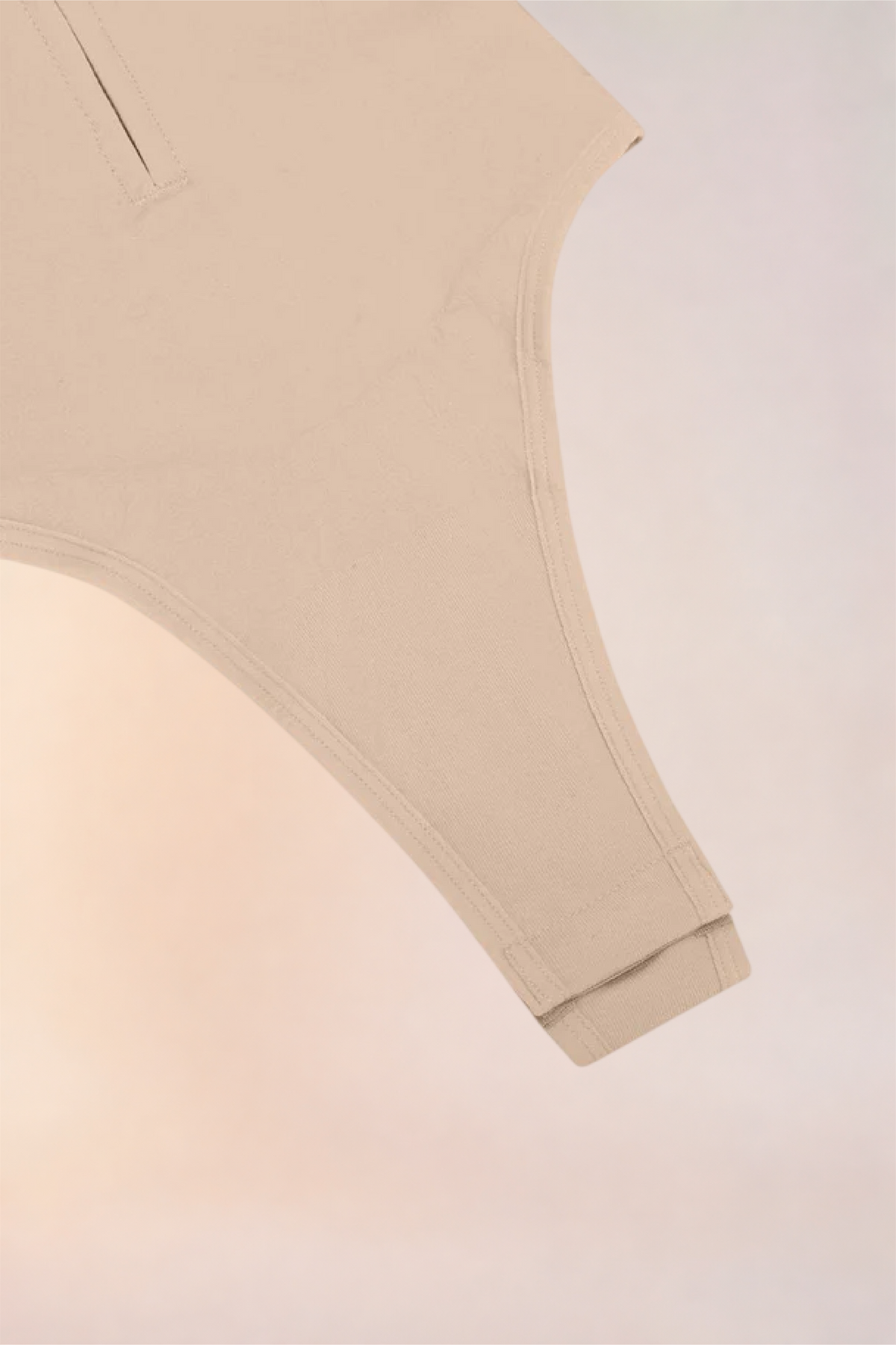 Close-up of the thong-cut gusset on the Skinzform Séjour Bodysuit in Nude