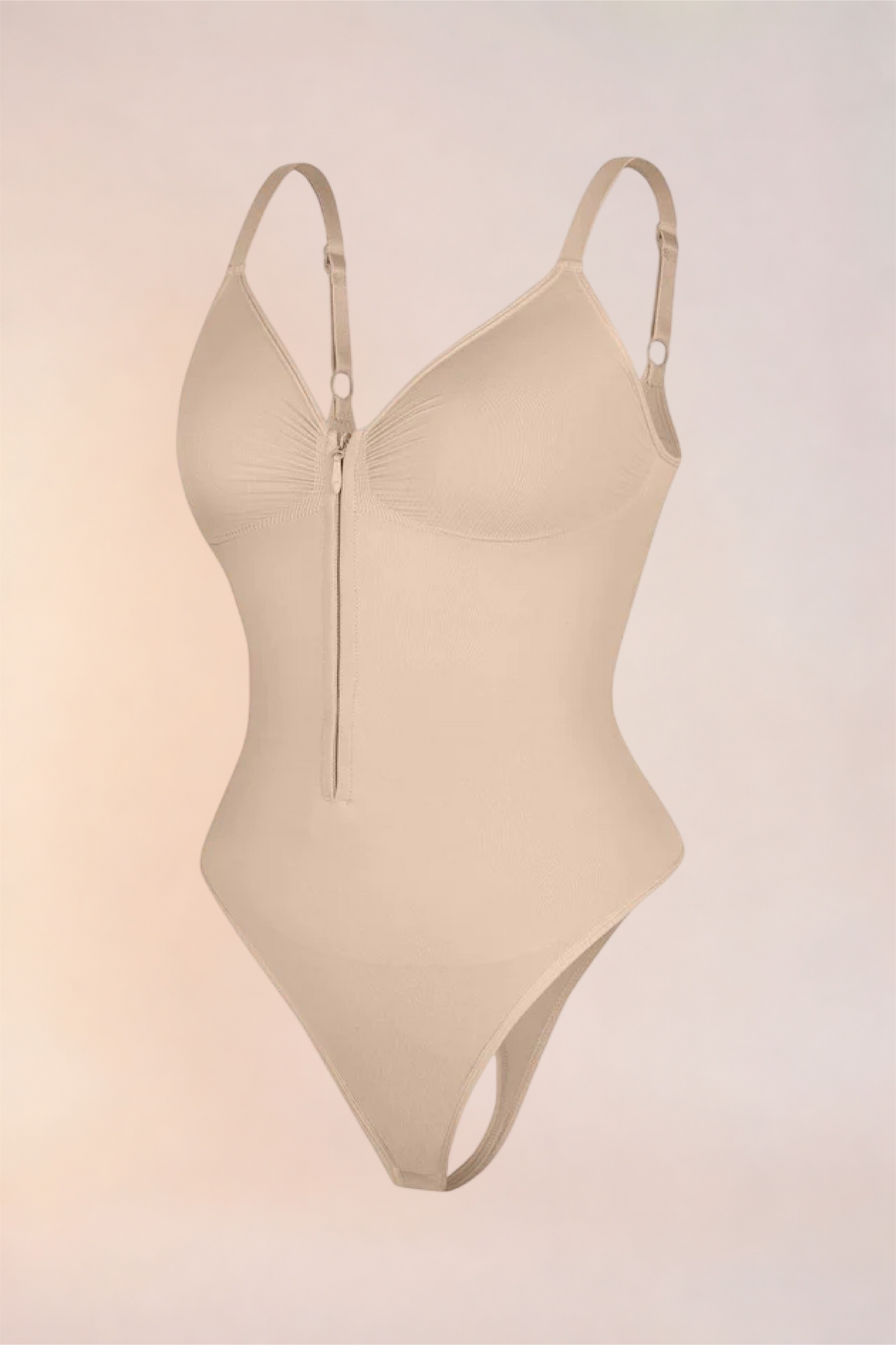Skinzform Séjour Bodysuit in Nude - product shot with the zip closed, front view
