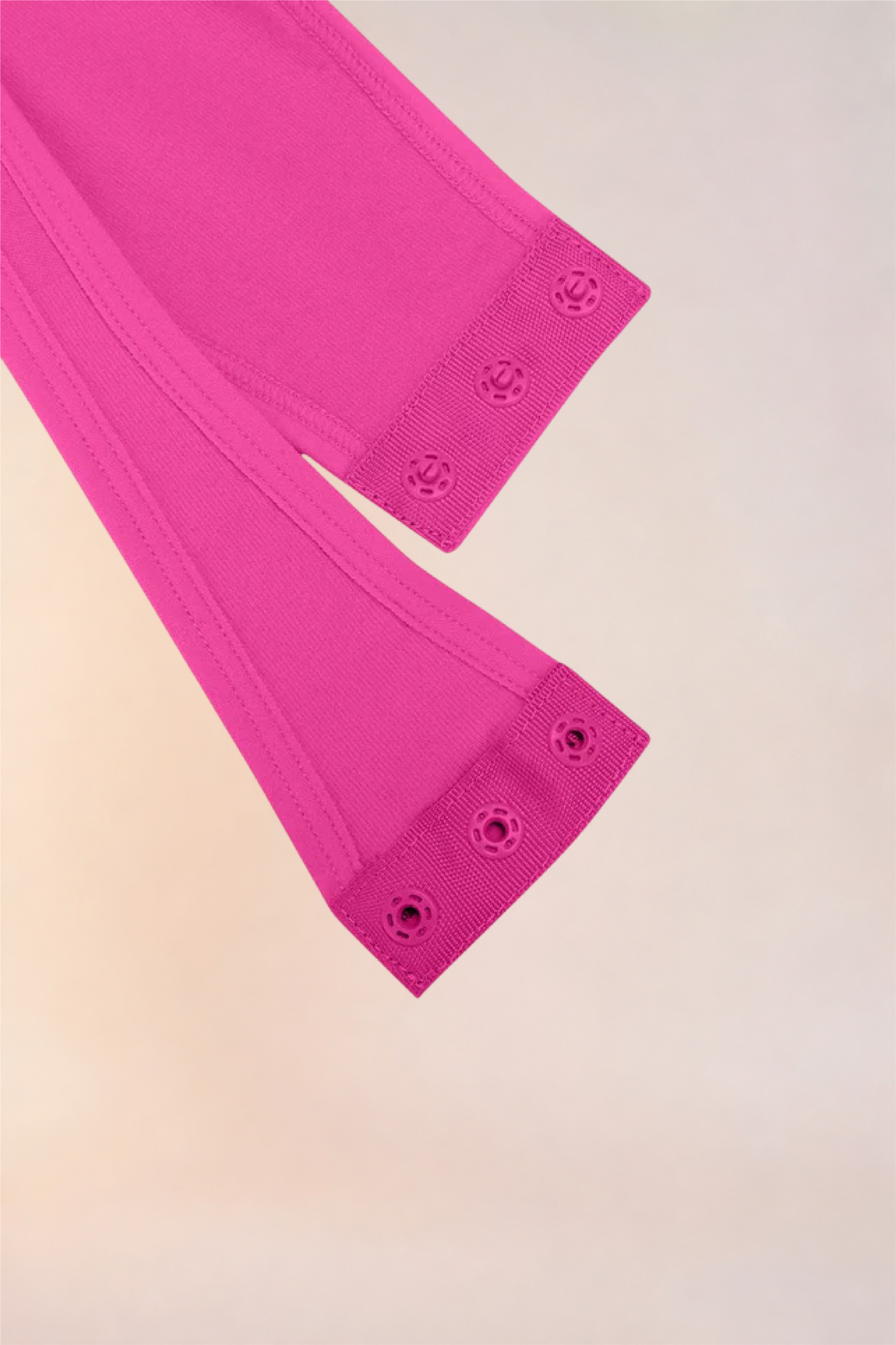 Close-up of the gusset snap fastening on the Skinzform Séjour Bodysuit in Rose