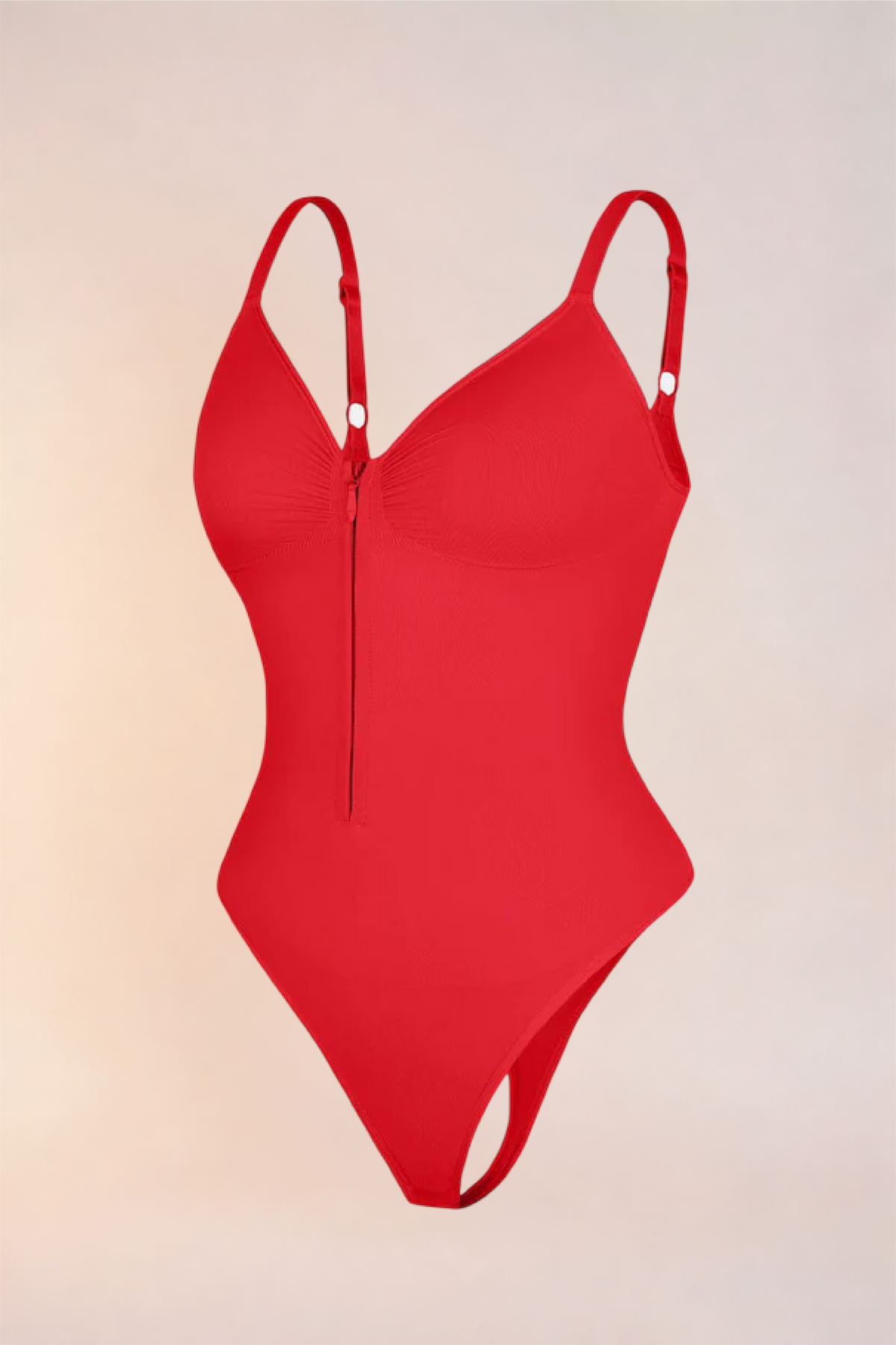 Skinzform Séjour Bodysuit in Rouge - product shot with the zip closed, front view
