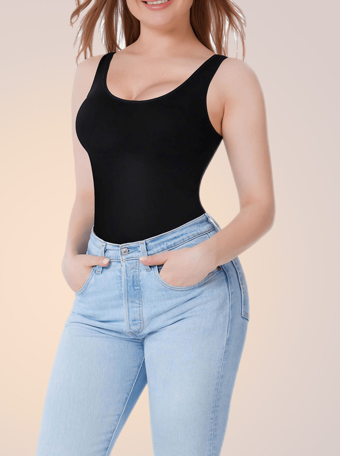 Skinzform Shape Vest in Noir styled with jeans, front view