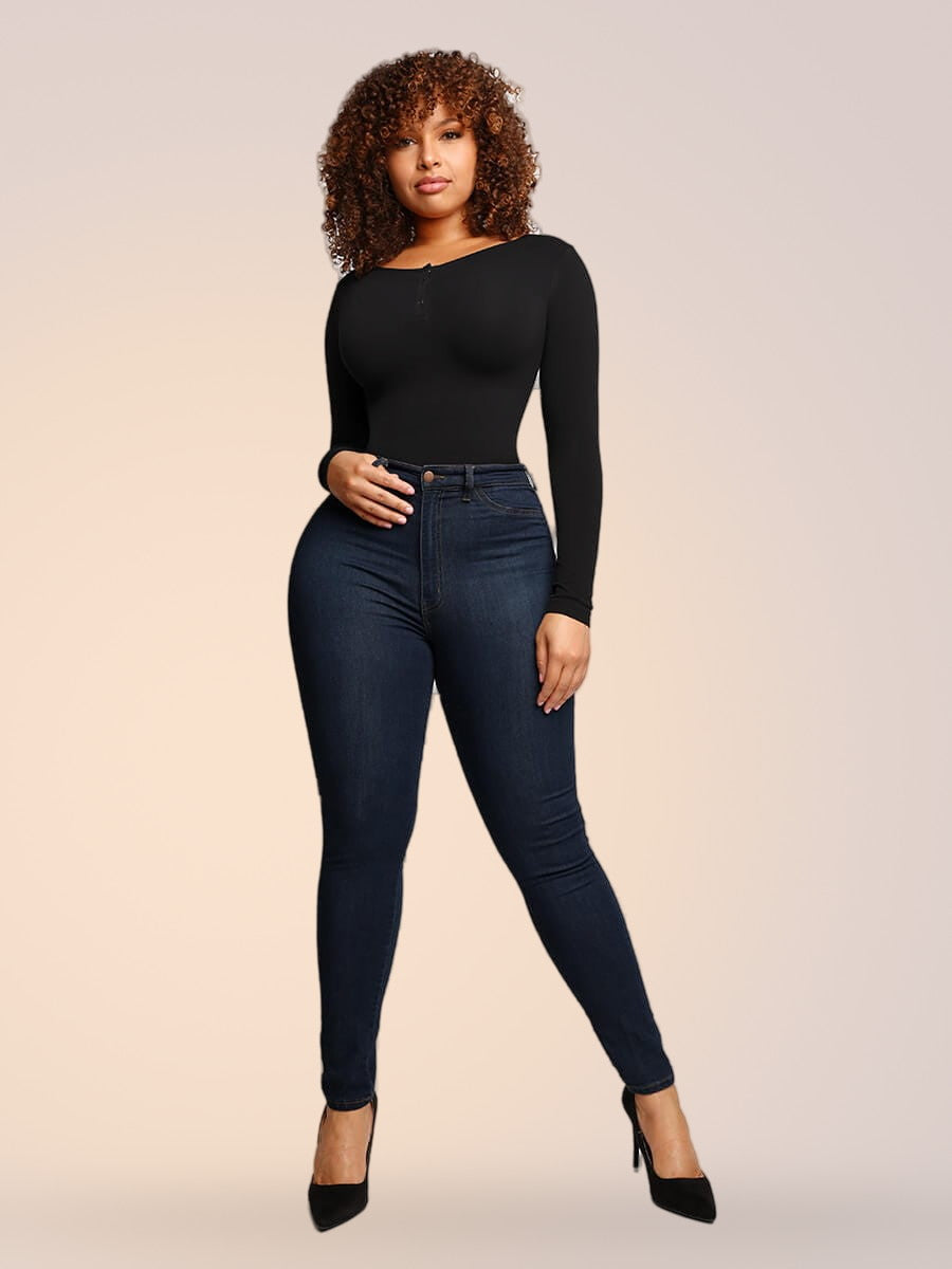 Skinzform Sleek Bodysuit in Noir styled with jeans and heels, full-length front view