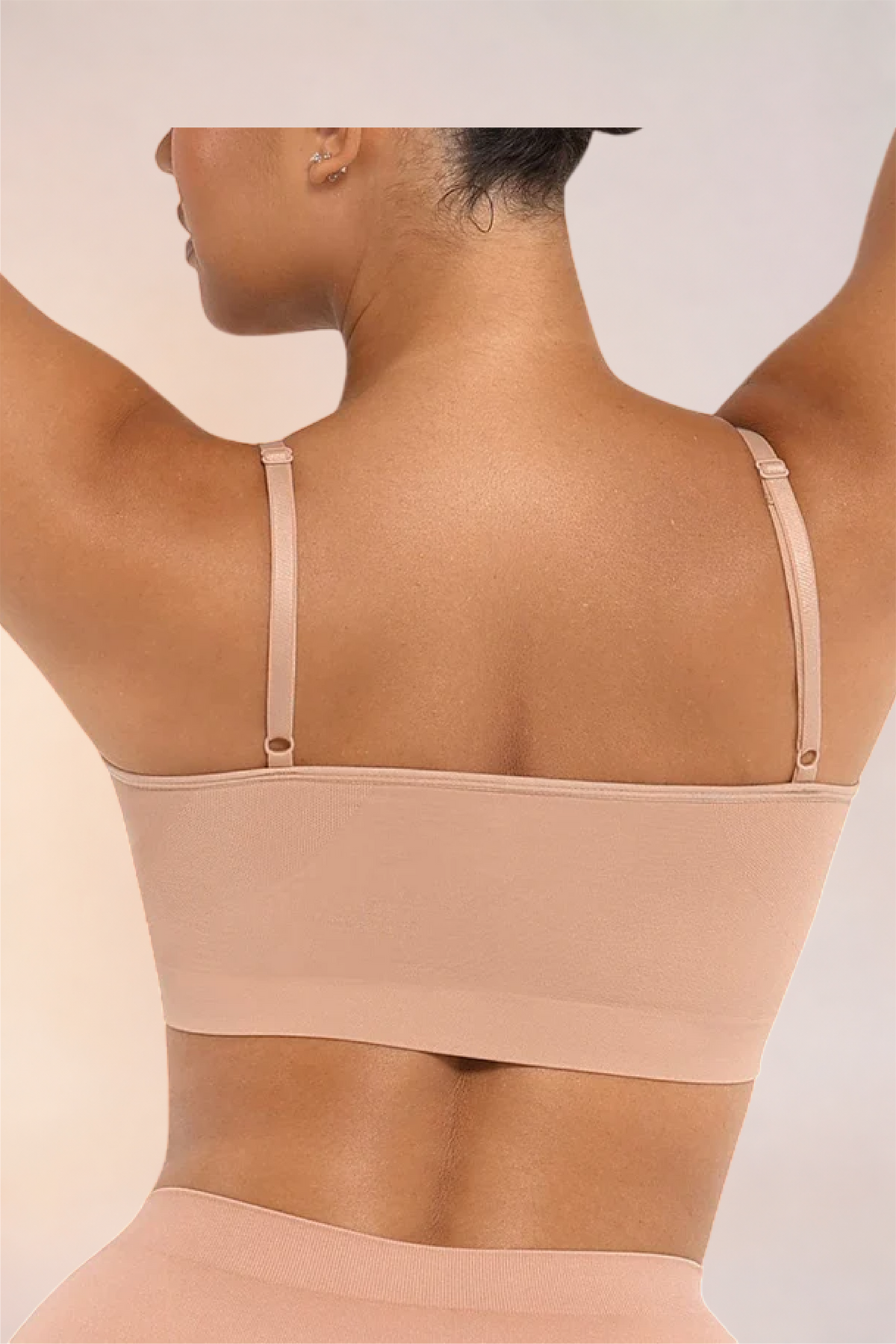 Close-up of the back band and adjustable straps on the Skinzform Soutien Bra in Beige