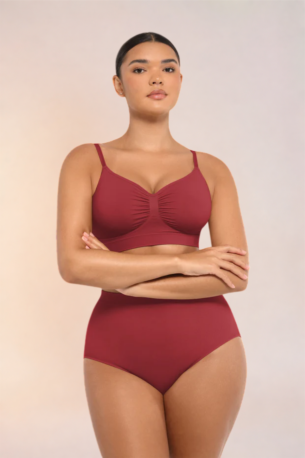 Skinzform Soutien Bra in Maroon - front view on the model with arms crossed
