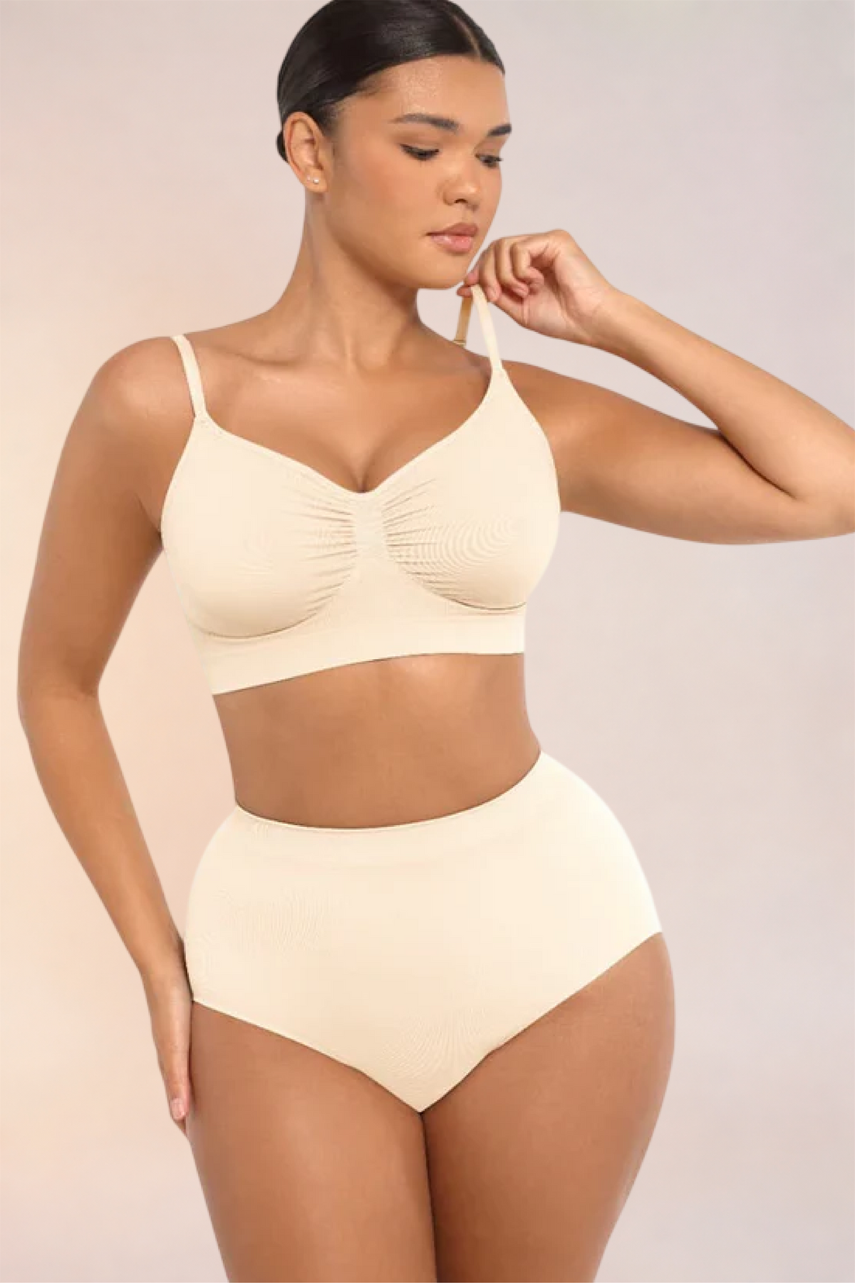 Skinzform Soutien Bra in Nude - wireless bralette with ruched centre, half-length front view