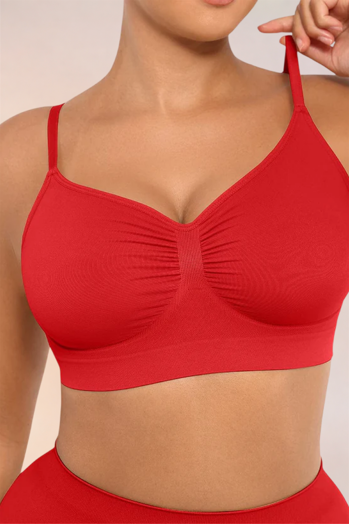 Close-up of the ruched centre front on the Skinzform Soutien Bra in Red