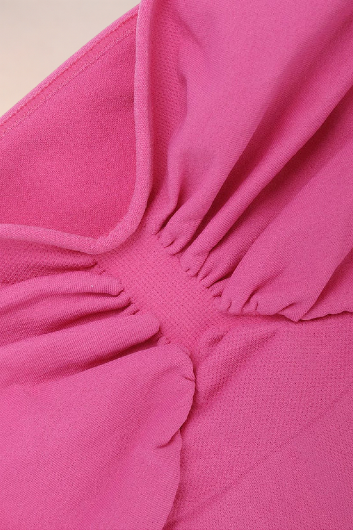Close-up of the ruched gathering on the Skinzform Soutien Bra in Rose