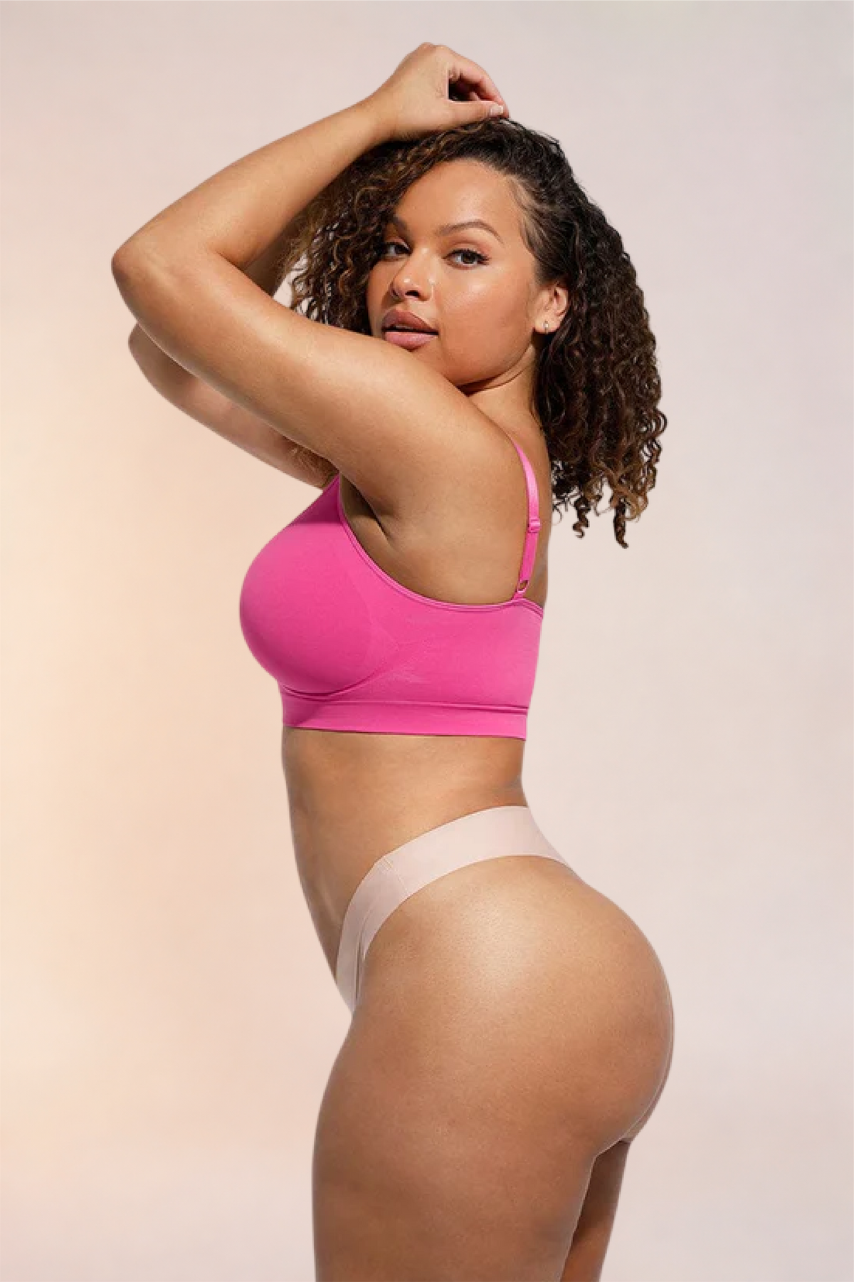 Skinzform Soutien Bra in Rose - half-length front view with arms raised