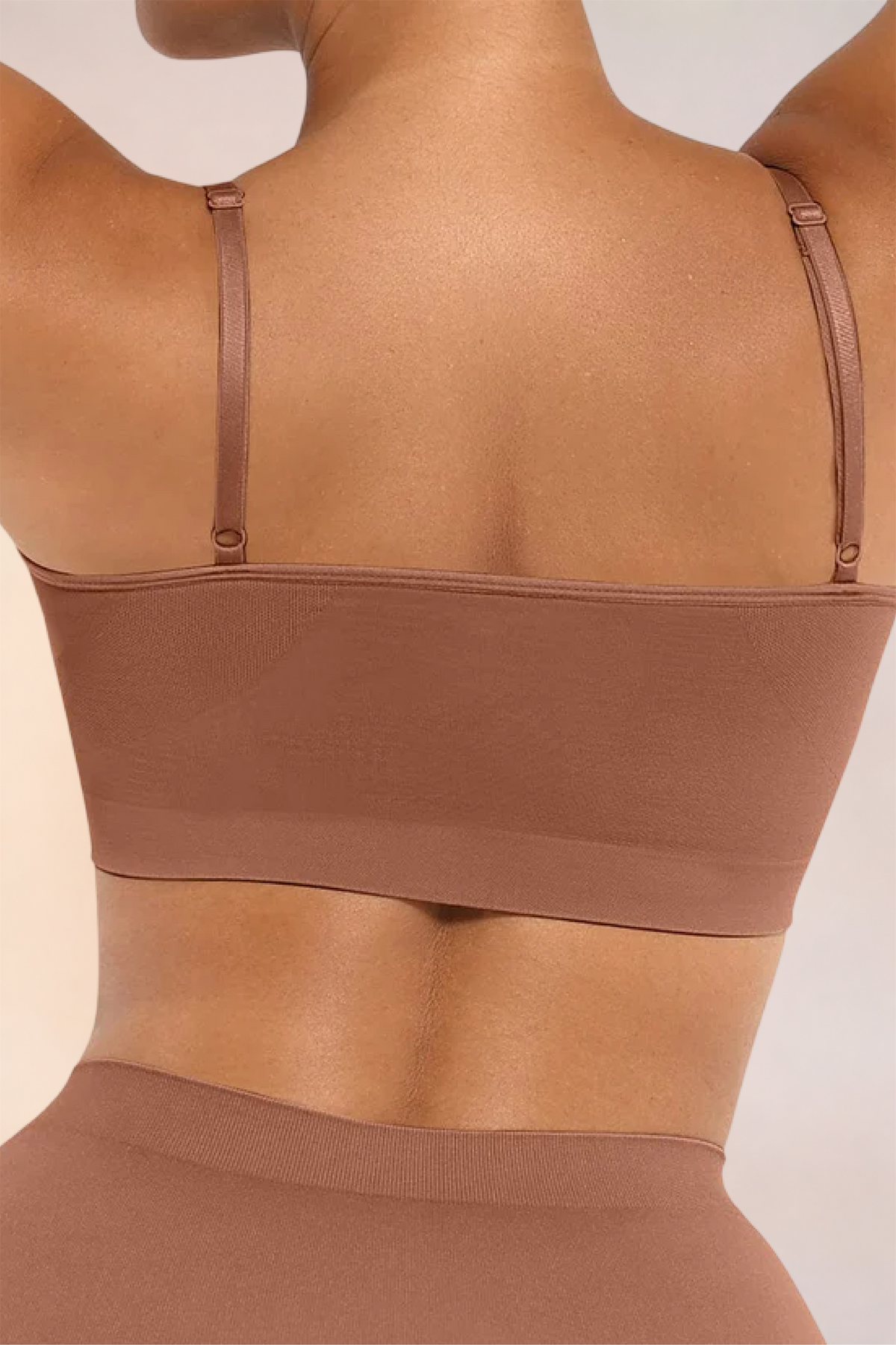 Close-up of the back band and adjustable straps on the Skinzform Soutien Bra in Tan