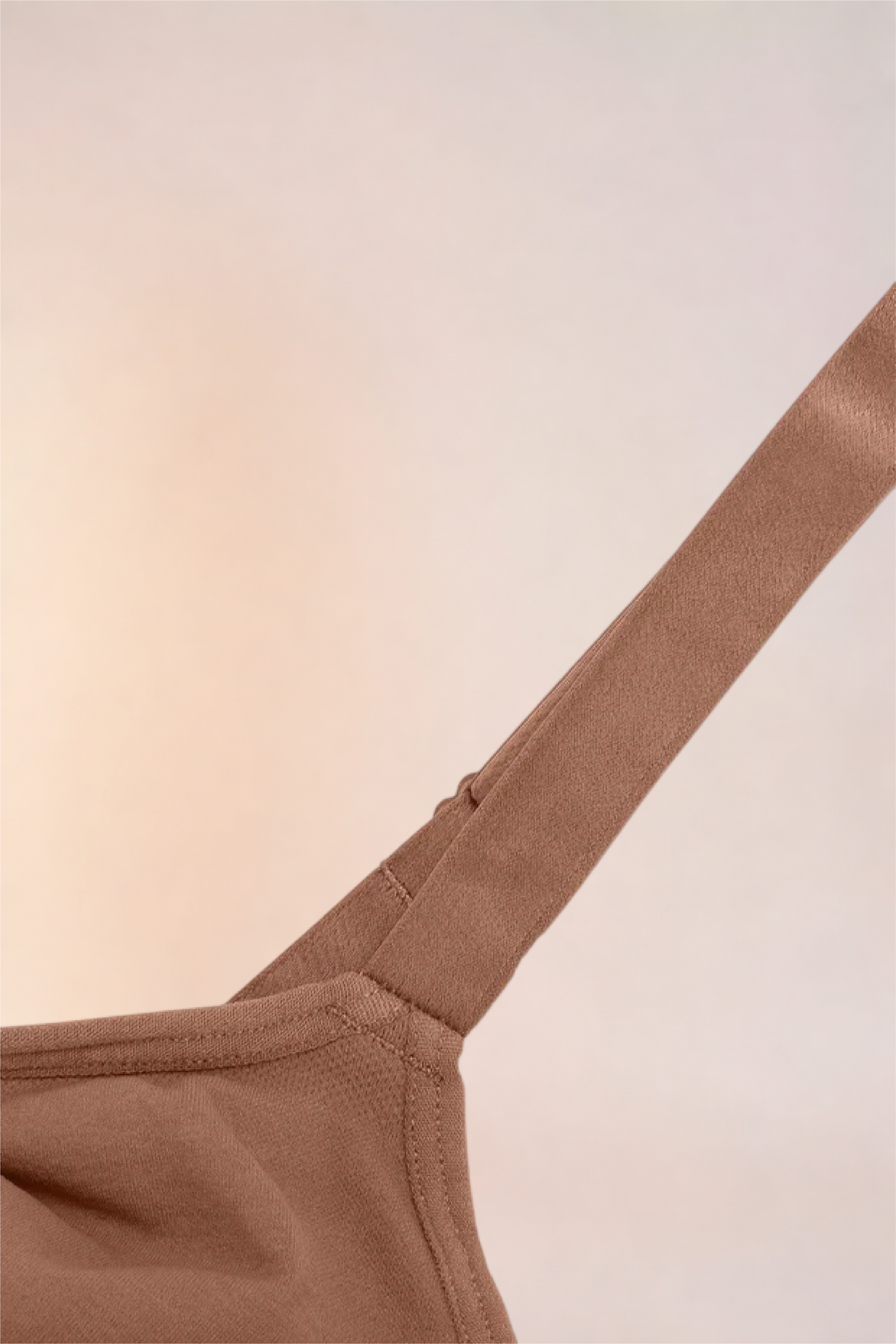 Close-up of the strap join and cup edge on the Skinzform Soutien Bra in Tan